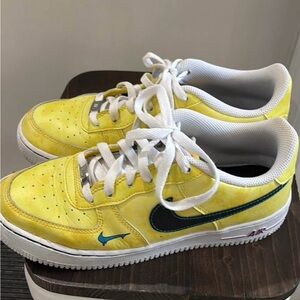 Nike Air Force ones ( peace, love and basketball)